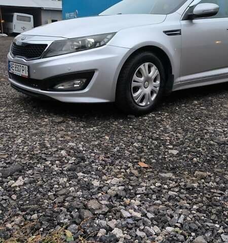 Серый Киа K5, объемом двигателя 2 л и пробегом 247 тыс. км за 8500 $, фото 1 на Automoto.ua