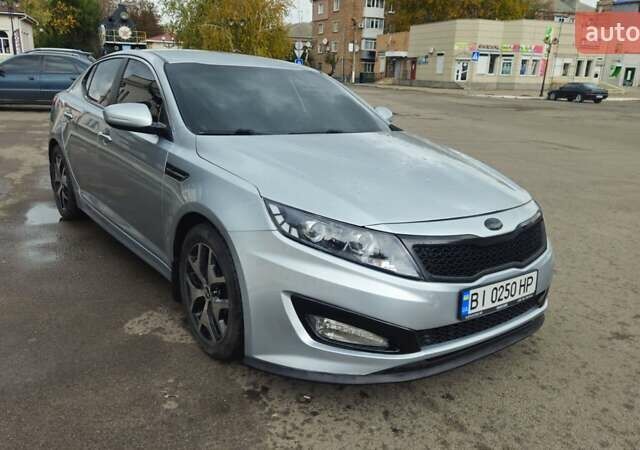 Серый Киа K5, объемом двигателя 2 л и пробегом 249 тыс. км за 8700 $, фото 8 на Automoto.ua