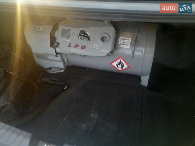 Сірий Кіа K5, об'ємом двигуна 2 л та пробігом 198 тис. км за 8200 $, фото 7 на Automoto.ua