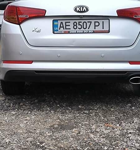 Серый Киа K5, объемом двигателя 2 л и пробегом 247 тыс. км за 8500 $, фото 2 на Automoto.ua