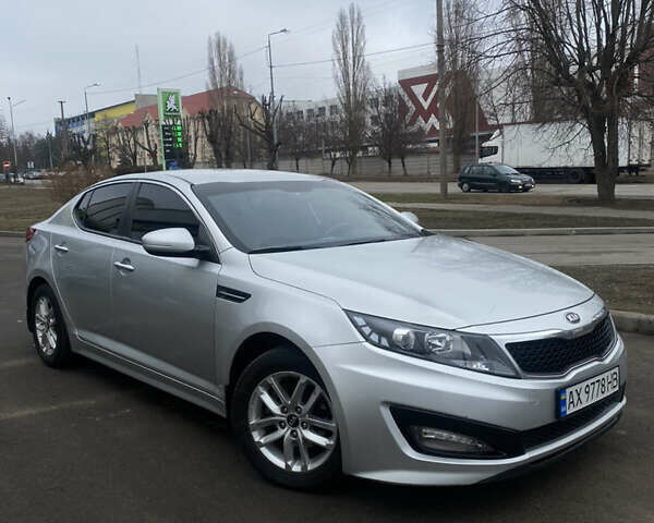 Серый Киа K5, объемом двигателя 2 л и пробегом 363 тыс. км за 8750 $, фото 2 на Automoto.ua