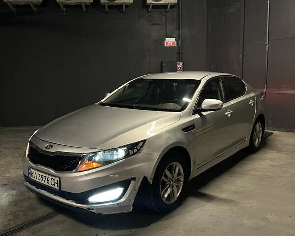 Серый Киа K5, объемом двигателя 2 л и пробегом 239 тыс. км за 8600 $, фото 3 на Automoto.ua