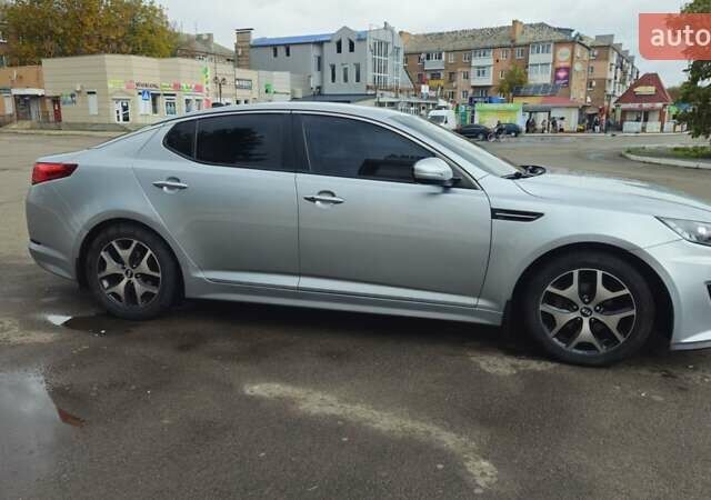 Серый Киа K5, объемом двигателя 2 л и пробегом 249 тыс. км за 8700 $, фото 10 на Automoto.ua