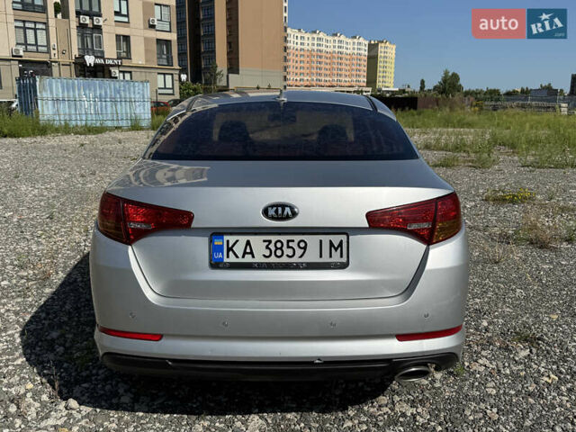 Серый Киа K5, объемом двигателя 2 л и пробегом 240 тыс. км за 6999 $, фото 4 на Automoto.ua