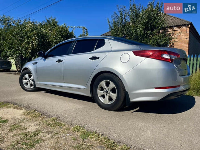 Сірий Кіа K5, об'ємом двигуна 2 л та пробігом 312 тис. км за 7999 $, фото 5 на Automoto.ua