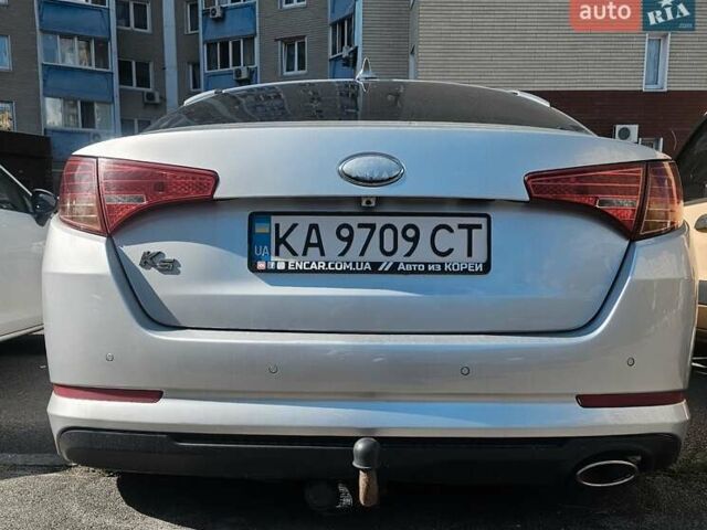 Серый Киа K5, объемом двигателя 2 л и пробегом 180 тыс. км за 6700 $, фото 1 на Automoto.ua