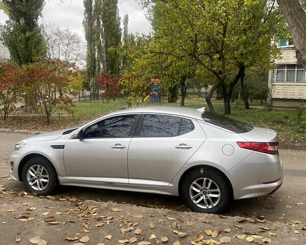 Серый Киа K5, объемом двигателя 2 л и пробегом 370 тыс. км за 8300 $, фото 6 на Automoto.ua