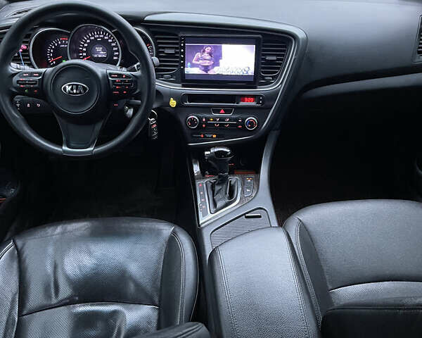 Серый Киа K5, объемом двигателя 2 л и пробегом 168 тыс. км за 10300 $, фото 9 на Automoto.ua