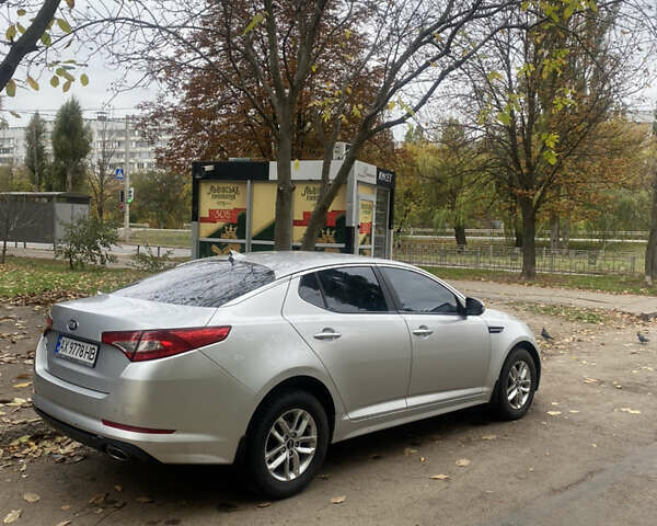 Серый Киа K5, объемом двигателя 2 л и пробегом 370 тыс. км за 8300 $, фото 5 на Automoto.ua