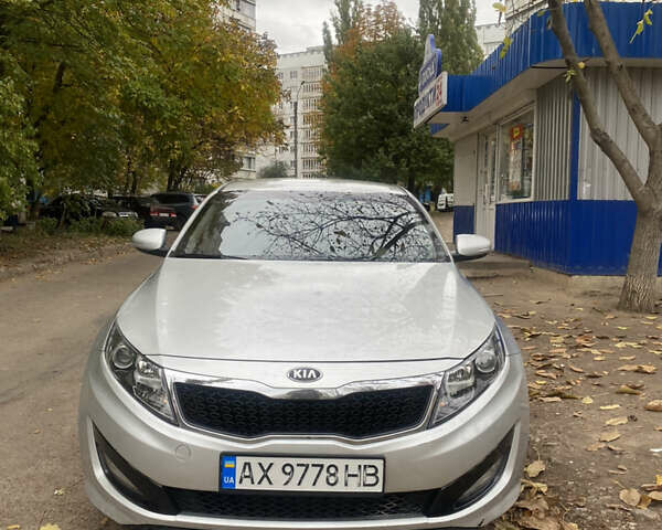 Серый Киа K5, объемом двигателя 2 л и пробегом 370 тыс. км за 8300 $, фото 7 на Automoto.ua