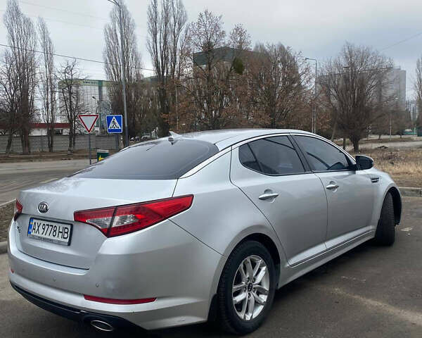 Серый Киа K5, объемом двигателя 2 л и пробегом 363 тыс. км за 7800 $, фото 7 на Automoto.ua