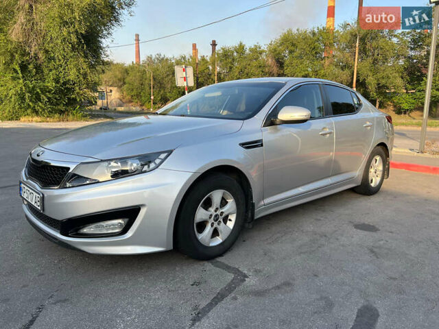Серый Киа K5, объемом двигателя 2 л и пробегом 311 тыс. км за 8700 $, фото 1 на Automoto.ua
