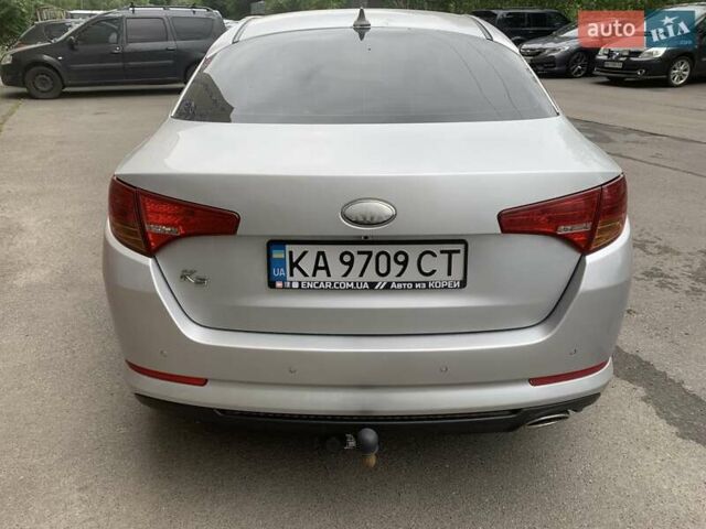 Серый Киа K5, объемом двигателя 2 л и пробегом 401 тыс. км за 7100 $, фото 21 на Automoto.ua