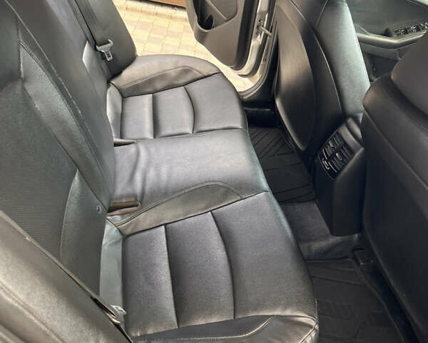 Серый Киа K5, объемом двигателя 2 л и пробегом 482 тыс. км за 8200 $, фото 12 на Automoto.ua