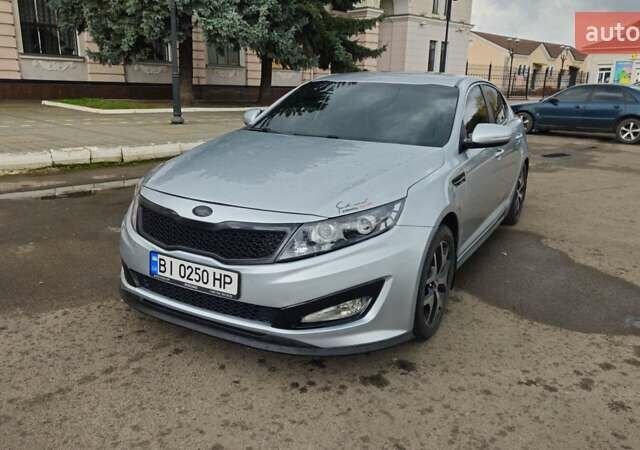 Серый Киа K5, объемом двигателя 2 л и пробегом 249 тыс. км за 8700 $, фото 6 на Automoto.ua