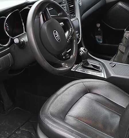 Серый Киа K5, объемом двигателя 2 л и пробегом 247 тыс. км за 8500 $, фото 5 на Automoto.ua