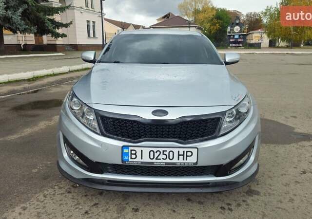 Серый Киа K5, объемом двигателя 2 л и пробегом 249 тыс. км за 8700 $, фото 4 на Automoto.ua