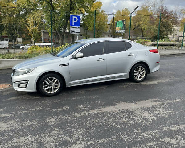 Серый Киа K5, объемом двигателя 2 л и пробегом 345 тыс. км за 8500 $, фото 1 на Automoto.ua