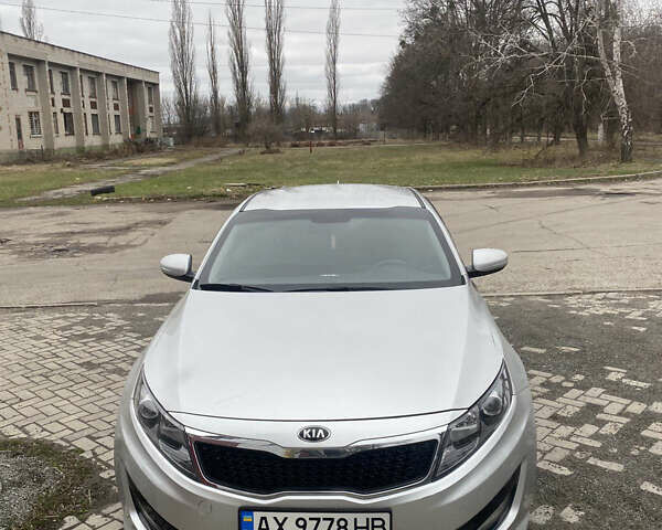 Серый Киа K5, объемом двигателя 2 л и пробегом 363 тыс. км за 7800 $, фото 1 на Automoto.ua