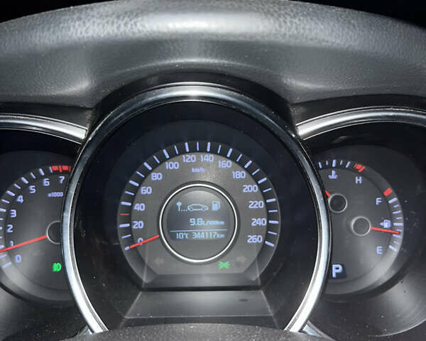 Серый Киа K5, объемом двигателя 2 л и пробегом 345 тыс. км за 8500 $, фото 13 на Automoto.ua