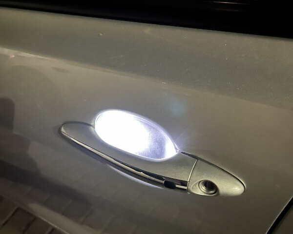 Серый Киа K5, объемом двигателя 2 л и пробегом 345 тыс. км за 8500 $, фото 8 на Automoto.ua