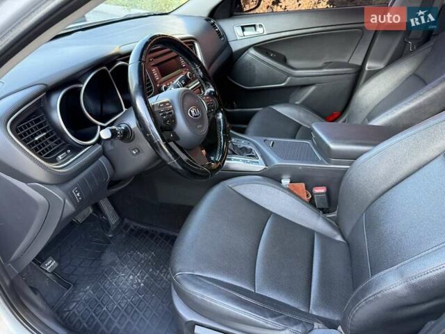 Серый Киа K5, объемом двигателя 2 л и пробегом 248 тыс. км за 9200 $, фото 11 на Automoto.ua