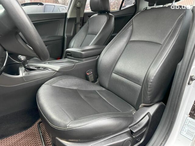 Серый Киа K5, объемом двигателя 2 л и пробегом 205 тыс. км за 10790 $, фото 19 на Automoto.ua