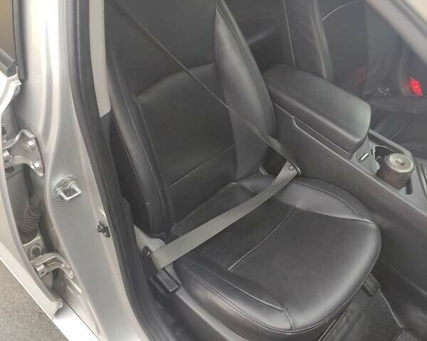 Серый Киа K5, объемом двигателя 2 л и пробегом 220 тыс. км за 9999 $, фото 10 на Automoto.ua