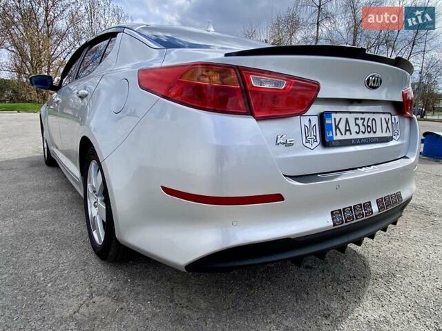 Серый Киа K5, объемом двигателя 2 л и пробегом 115 тыс. км за 10300 $, фото 12 на Automoto.ua