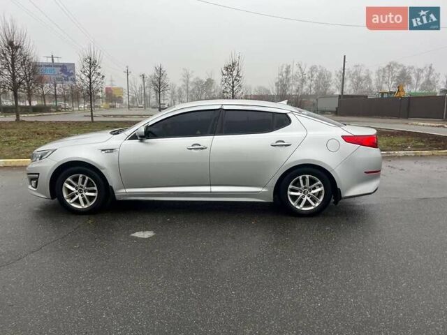 Серый Киа K5, объемом двигателя 2 л и пробегом 230 тыс. км за 8700 $, фото 1 на Automoto.ua