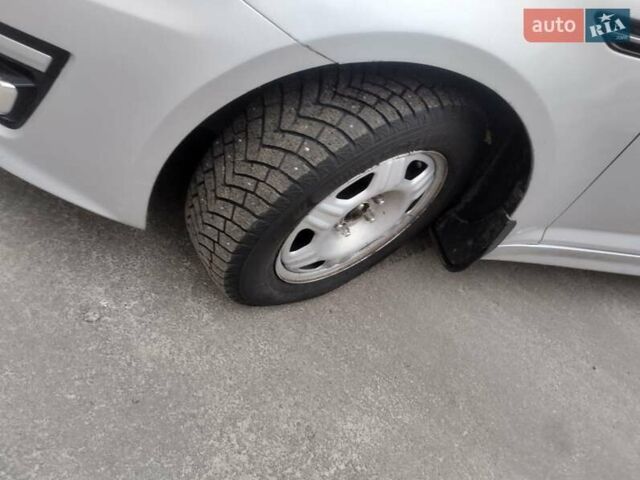 Серый Киа K5, объемом двигателя 2 л и пробегом 261 тыс. км за 6999 $, фото 7 на Automoto.ua