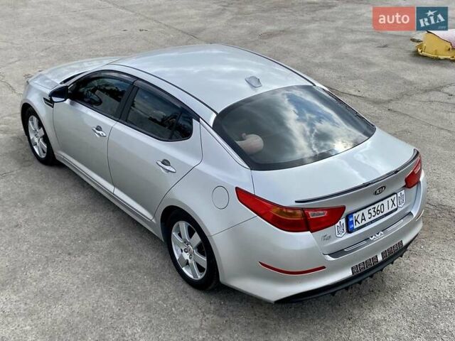Серый Киа K5, объемом двигателя 2 л и пробегом 115 тыс. км за 10300 $, фото 6 на Automoto.ua