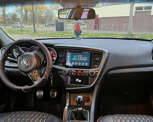 Серый Киа K5, объемом двигателя 2 л и пробегом 245 тыс. км за 9100 $, фото 5 на Automoto.ua