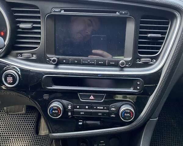 Серый Киа K5, объемом двигателя 2 л и пробегом 238 тыс. км за 10800 $, фото 5 на Automoto.ua