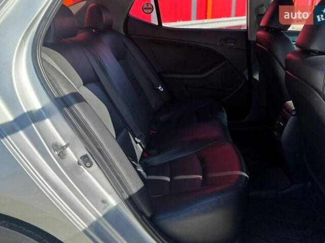Сірий Кіа K5, об'ємом двигуна 2 л та пробігом 225 тис. км за 9790 $, фото 10 на Automoto.ua