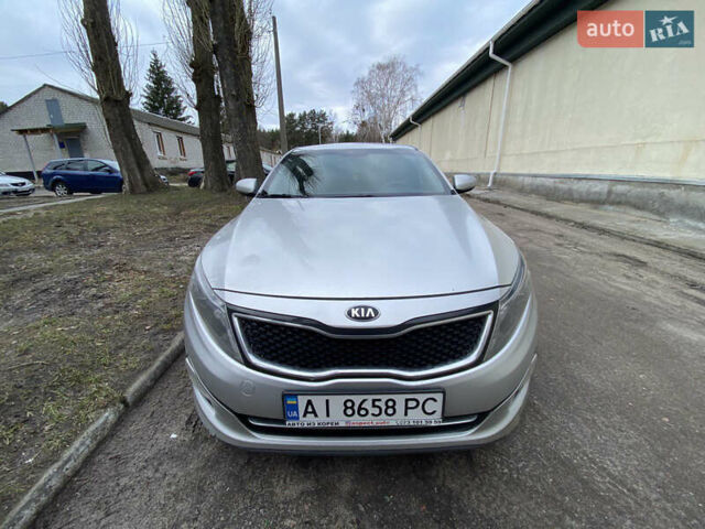 Серый Киа K5, объемом двигателя 2 л и пробегом 200 тыс. км за 9200 $, фото 2 на Automoto.ua