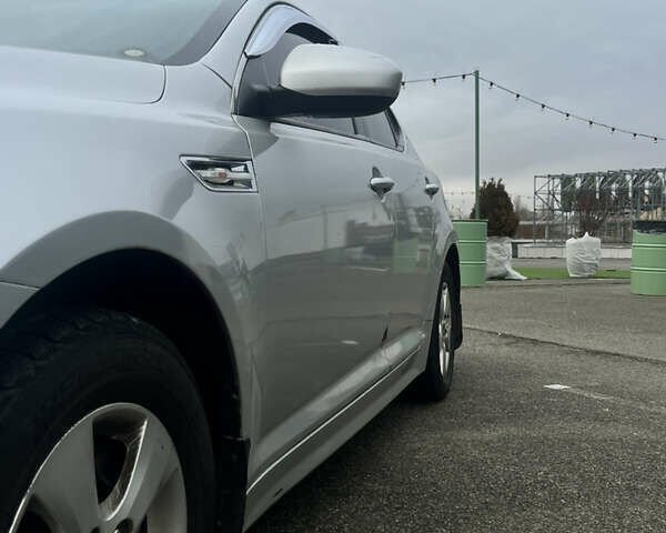 Серый Киа K5, объемом двигателя 2 л и пробегом 246 тыс. км за 7600 $, фото 7 на Automoto.ua