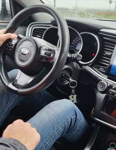 Серый Киа K5, объемом двигателя 2 л и пробегом 202 тыс. км за 9308 $, фото 4 на Automoto.ua