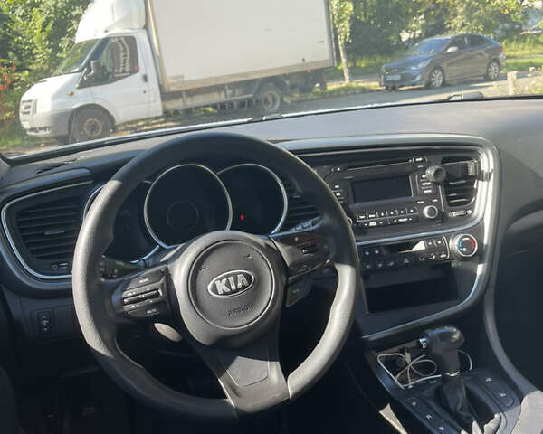 Серый Киа K5, объемом двигателя 2 л и пробегом 394 тыс. км за 10000 $, фото 8 на Automoto.ua
