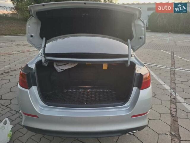 Серый Киа K5, объемом двигателя 2 л и пробегом 239 тыс. км за 12652 $, фото 10 на Automoto.ua