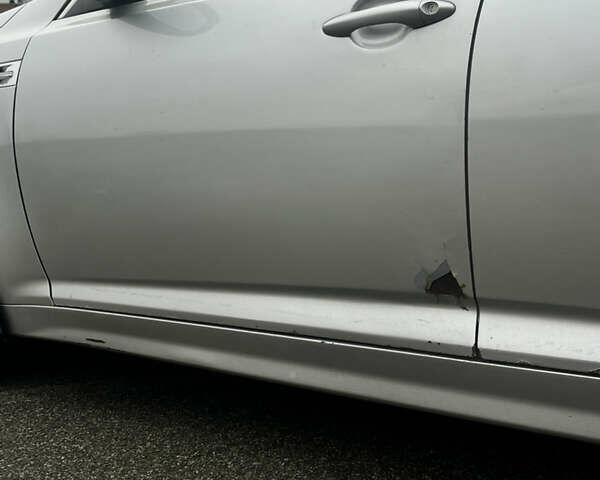 Серый Киа K5, объемом двигателя 2 л и пробегом 246 тыс. км за 7600 $, фото 10 на Automoto.ua