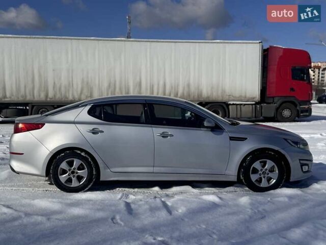 Серый Киа K5, объемом двигателя 2 л и пробегом 451 тыс. км за 7898 $, фото 7 на Automoto.ua