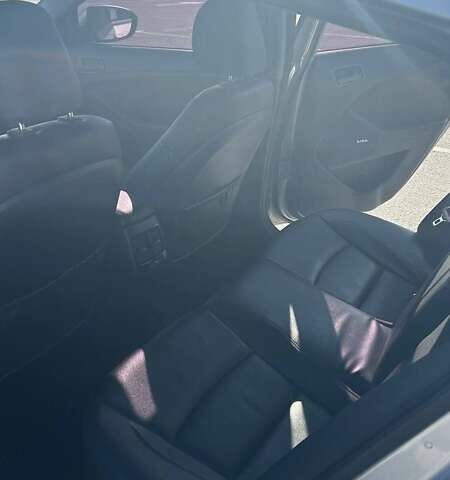 Серый Киа K5, объемом двигателя 2 л и пробегом 340 тыс. км за 8999 $, фото 10 на Automoto.ua