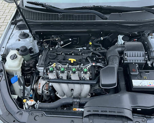 Серый Киа K5, объемом двигателя 2 л и пробегом 245 тыс. км за 9100 $, фото 9 на Automoto.ua