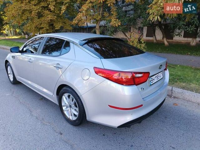 Серый Киа K5, объемом двигателя 2 л и пробегом 202 тыс. км за 12300 $, фото 1 на Automoto.ua