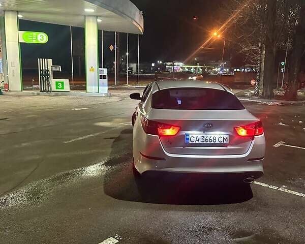 Серый Киа K5, объемом двигателя 2 л и пробегом 304 тыс. км за 8000 $, фото 38 на Automoto.ua