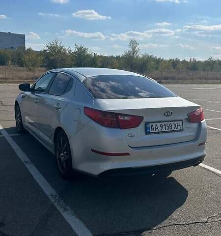 Серый Киа K5, объемом двигателя 2 л и пробегом 340 тыс. км за 8999 $, фото 7 на Automoto.ua