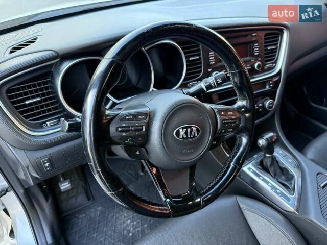 Серый Киа K5, объемом двигателя 2 л и пробегом 248 тыс. км за 9200 $, фото 6 на Automoto.ua