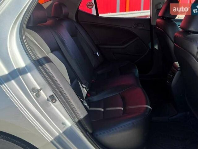 Сірий Кіа K5, об'ємом двигуна 2 л та пробігом 225 тис. км за 9490 $, фото 10 на Automoto.ua