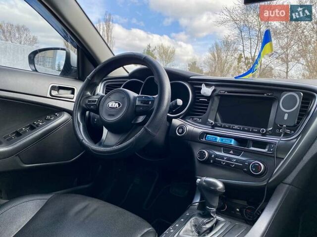 Серый Киа K5, объемом двигателя 2 л и пробегом 115 тыс. км за 10300 $, фото 19 на Automoto.ua